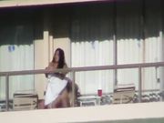Horny young couple caught by spy cam fucking on balcony