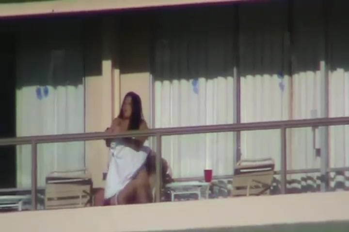 Horny young couple caught by spy cam fucking on balcony image