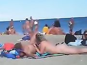 Swinger nudist couples making sex at the beach