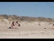 Swinger nudist girl caught fucking with some strangers on beach