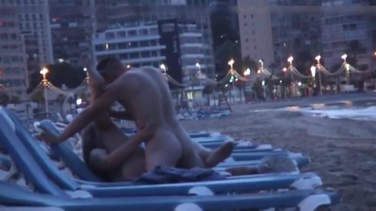 Horny amateur couple caught fucking on a Spanish beach picture