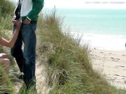 Public handjob with cumshot at the beach hidden in the bushes