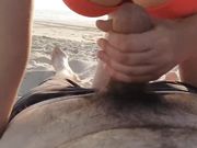 Real amateur handjob at the beach with cum tasting