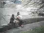 Girl watching an exhibitionist couple making sex in park